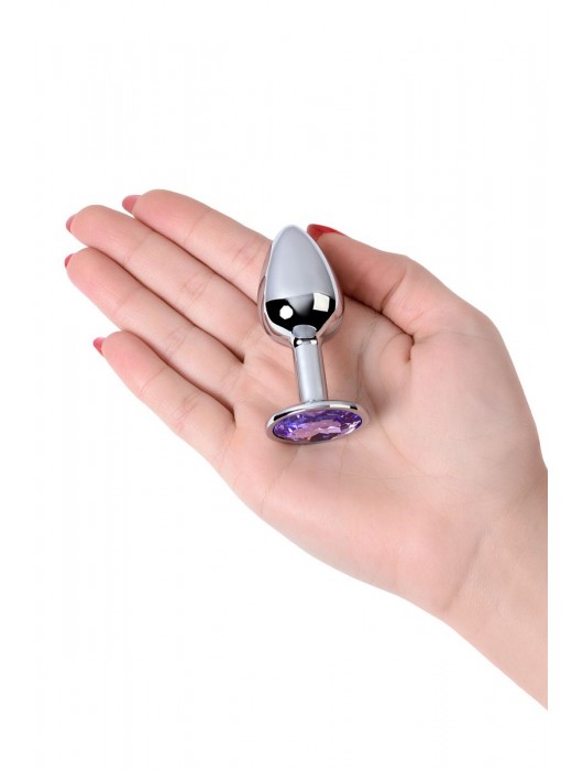 Серебристая конусовидная анальная пробка с фиолетовым кристаллом - 7 см. - ToyFa - купить с доставкой в Первоуральске